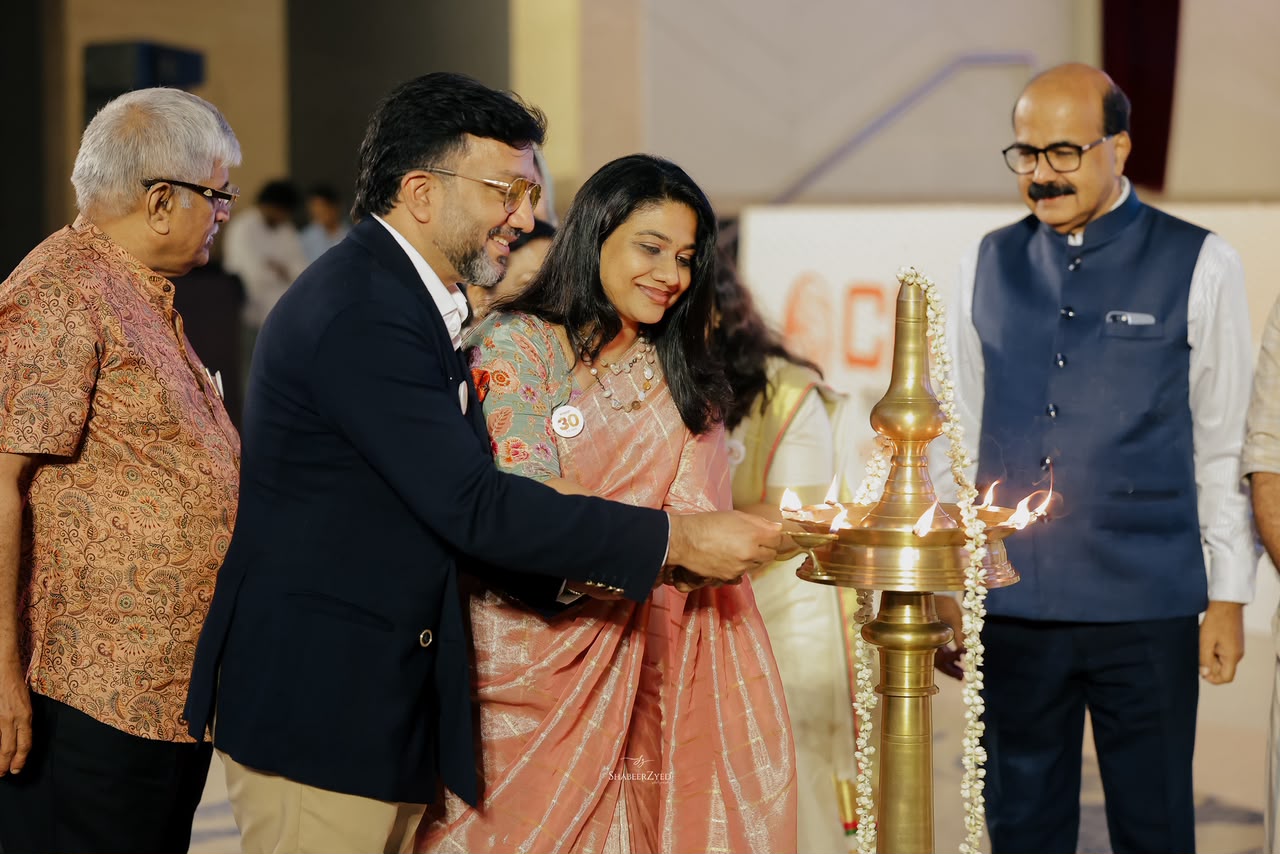 Asia Book of Records certificate presented to Dr. K.K. Gopinathan at Triple Joy 2026